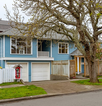 Inviting split-level home with a garage, spacious yard, and a welcoming atmosphere near local amenities.