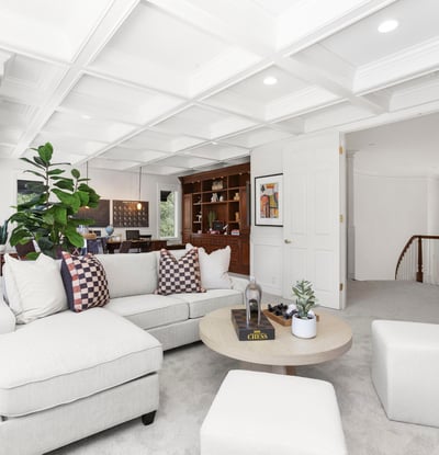 Stunning Coffered ceilings welcome you into the perfect entertaining space with room for a movie night, games party or even space for work/school desk and more (includes TV)