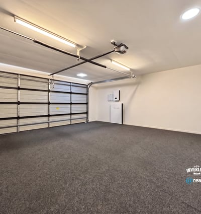 Spacious garage with ample storage options and a clean, versatile layout ready for your projects.