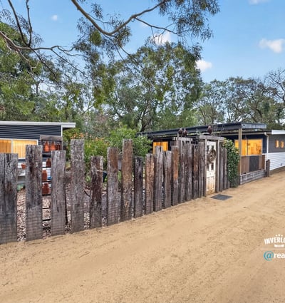 Discover a unique property with rustic fencing, surrounded by nature and offering a peaceful retreat.