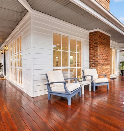 Spacious deck perfect for outdoor relaxation, featuring ample natural light and modern architectural details.