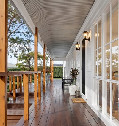 Discover this inviting porch offering a perfect blend of outdoor relaxation and easy access to the home.