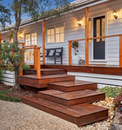 Discover outdoor living with a welcoming entryway, perfect for entertaining or enjoying peaceful moments.