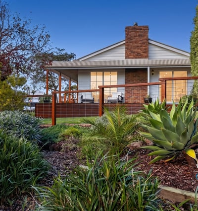 Discover a stunning home with expansive outdoor spaces and picturesque landscaping, perfect for relaxing or entertaining.