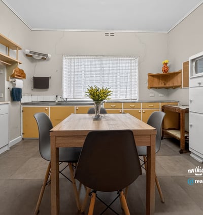 Bright and functional kitchen with modern cabinetry and ample space for dining and entertaining.