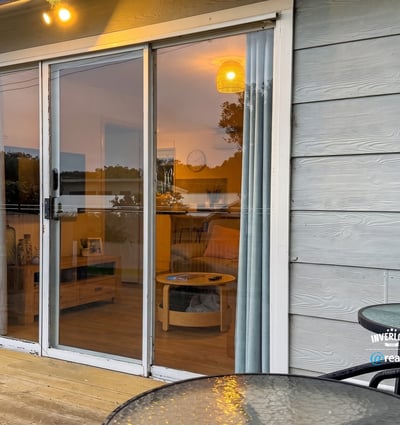 Bright and inviting space with large sliding doors, perfect for enjoying indoor-outdoor living.