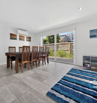 Spacious dining area with natural light, offering a seamless connection to the outdoor space.