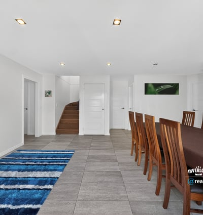 Spacious dining area features modern finishes, natural light, and a seamless flow to adjacent living spaces.