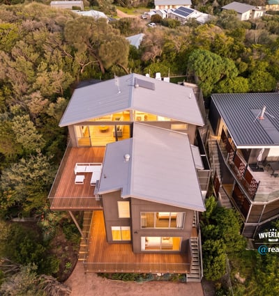 Discover this modern coastal retreat, featuring dynamic architecture and expansive outdoor living spaces surrounded by nature.