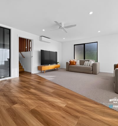 Bright and spacious living area featuring modern design and seamless indoor-outdoor flow.