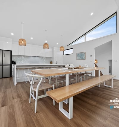 Spacious kitchen and dining area featuring modern appliances, ample natural light, and a generous layout.