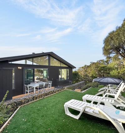Contemporary home featuring lush outdoor space, perfect for entertaining and enjoying scenic views.