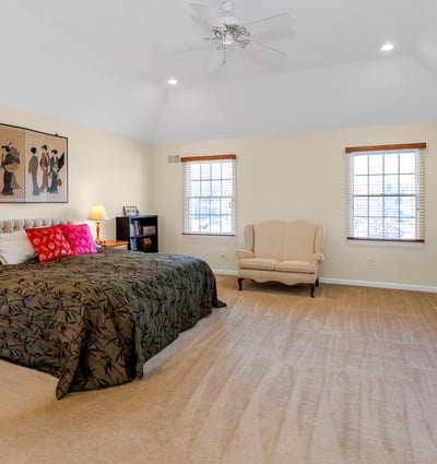 Unwind in the spacious and inviting Primary Suite with attractive tray ceiling, recessed lighting, and ceiling fan.
