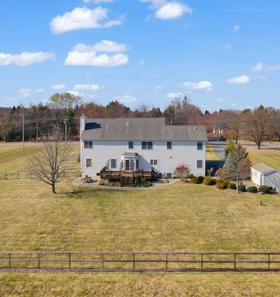 Amenities of this well-designed home include a home warranty, 2-zone heating and cooling, natural gas, and central vacuum.