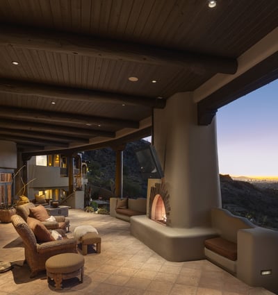 This stunning covered patio becomes magical after sunset, with a built-in kiva fireplace and soft lighting. Overlooking the city lights of Paradise Valley, it's an entertainer s dream or a peaceful escape.