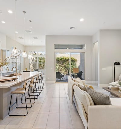 Stunning great room with tall ceilings, expansive windows, and open sightlines that enhance light, space, and livability throughout the home.