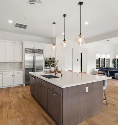 High-end kitchen with premium appliances, quartz surfaces, and sleek cabinetry. A standout feature for Scottsdale buyers who value luxury and functionality.