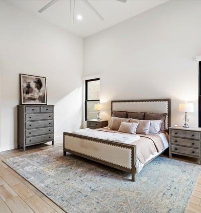 Generously sized primary bedroom with soft natural light and neutral design elements. A calm, inviting retreat in this Scottsdale luxury home.