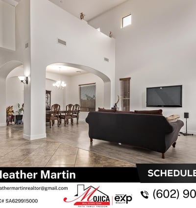 The spacious living room features abundant natural light, modern flooring updates, and a fluid layout that connects to the dining space. This Glendale home offers comfort and style throughout.