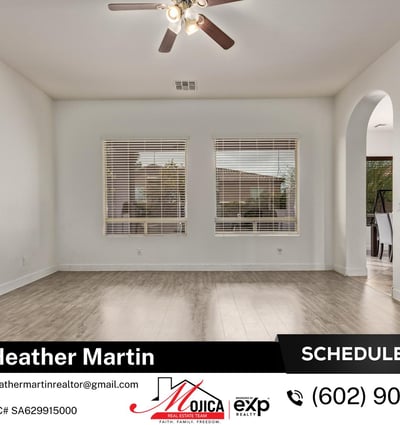 Dual windows fill this family room with natural light while maintaining privacy. The open layout enhances flow throughout this Glendale home for sale with private backyard pool.
