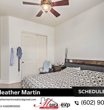 Large enough for a sitting area, this primary bedroom offers neutral finishes and modern updates. A peaceful retreat within this Glendale property featuring energy-efficient design and open living spaces.