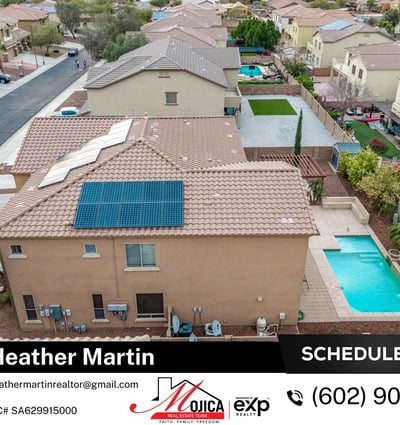Top-down view showcases the extensive solar panel installation for energy efficiency. The tile roof and pool area enhance this Glendale home s overall appeal.