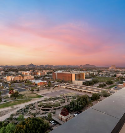 Spacious rooftop deck with unobstructed views of the city and mountains, enhancing the appeal of this Phoenix residence.