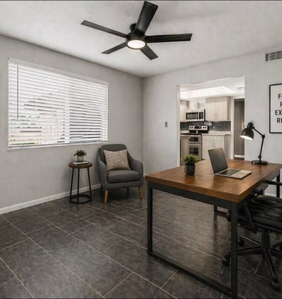 Staged workspace highlighting flexibility and modern design. This Sun City home offers updated interiors ideal for remote work or creative space.