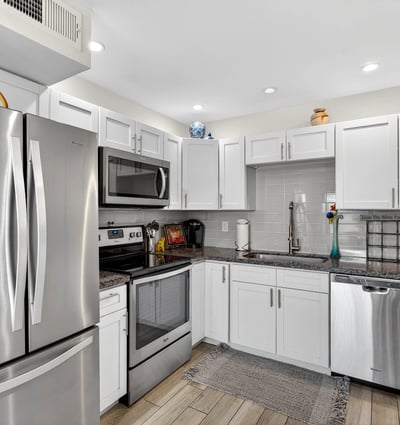 Sleek kitchen in Scottsdale with stainless steel appliances, contemporary cabinetry, and durable counters for a clean, updated look.