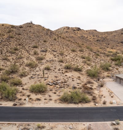 Elevated desert homesite with nearby hiking trail access and scenic mountain views. This Phoenix property combines natural desert beauty, privacy, and luxury custom home potential in a highly desirable hillside location.