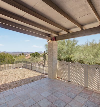 Take in beautiful desert and mountain vistas from this covered patio retreat. The spacious outdoor area is perfect for entertaining, outdoor dining, or simply enjoying the peaceful Fountain Hills setting.