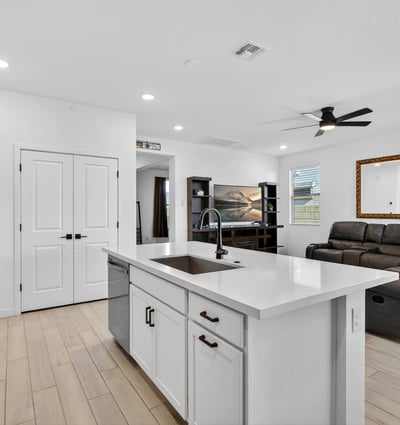 Experience effortless living with a bright open-concept layout that blends the kitchen and great room together, creating an ideal space for entertaining guests and enjoying everyday life in Surprise.