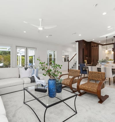 Bright, open-concept living space featuring modern furnishings, large windows, and seamless indoor-outdoor connectivity.