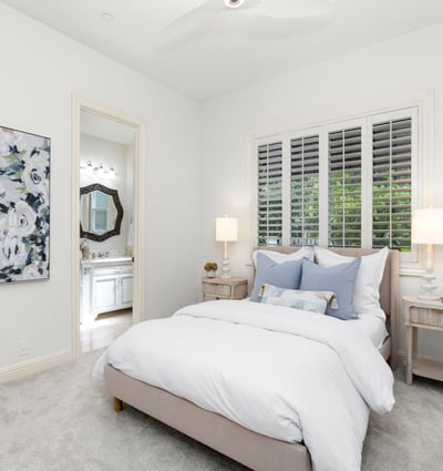 Downstairs Bedroom 1
Bright and inviting bedroom featuring soft decor, modern finishes, and natural light filtering through plantation shutters.
