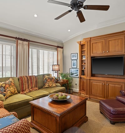 200-year-old milled pine cabinetry from the Green River area near Asheville extends into the informal sitting area