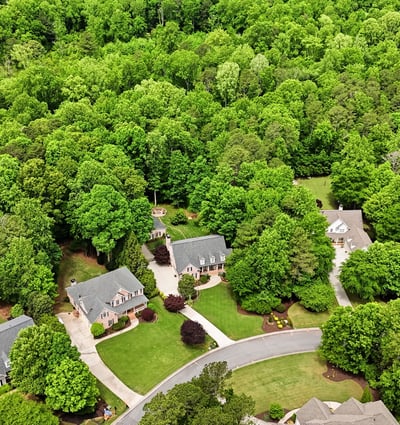 Discover this spacious neighborhood surrounded by lush greenery, offering both privacy and community connectivity.