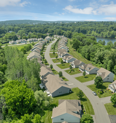 Discover a peaceful neighborhood with spacious homes, surrounded by lush greenery and scenic views.