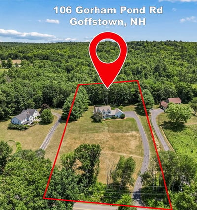 Spacious property on 106 Gorham Pond Rd offers abundant land and picturesque views in Goffstown, NH.