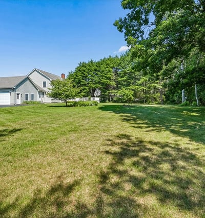 Spacious property featuring a vast lawn, ideal for outdoor activities and future landscaping opportunities.