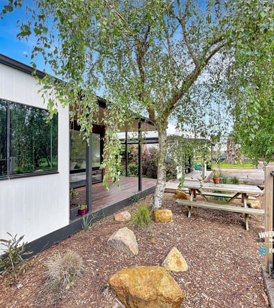 This property features a modern home surrounded by landscaped outdoor spaces ideal for entertaining and relaxation.