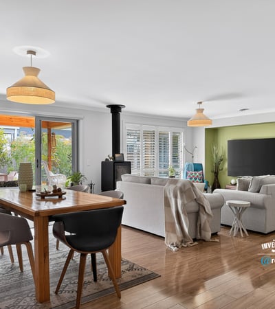 Bright and spacious living area with modern design, seamlessly connecting indoor and outdoor spaces for relaxed living.