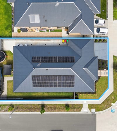 Spacious property featuring solar panels, ample yard space, and convenient access to nearby amenities.