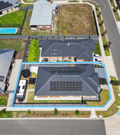 Spacious property featuring solar panels, ample outdoor space, and convenient access to local amenities.