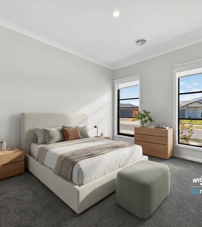 Light-filled bedroom featuring a modern design, spacious layout, and large windows overlooking the neighborhood.