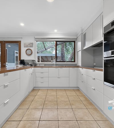 Modern kitchen featuring ample storage, contemporary appliances, and a spacious layout ideal for cooking and entertaining.