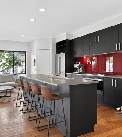 Contemporary kitchen featuring sleek cabinetry, a spacious island, and an open layout perfect for entertaining.