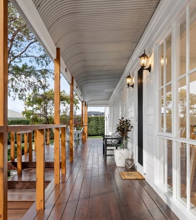 Discover this inviting porch offering a perfect blend of outdoor relaxation and easy access to the home.