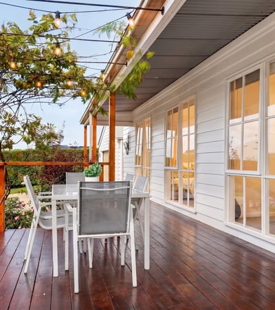Inviting outdoor space with string lights, perfect for entertaining or relaxing in the fresh air.