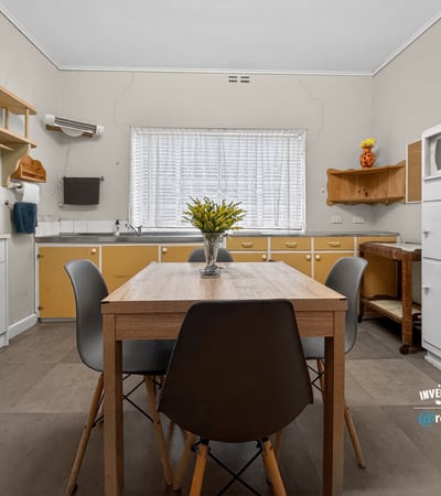 Bright and functional kitchen with modern cabinetry and ample space for dining and entertaining.