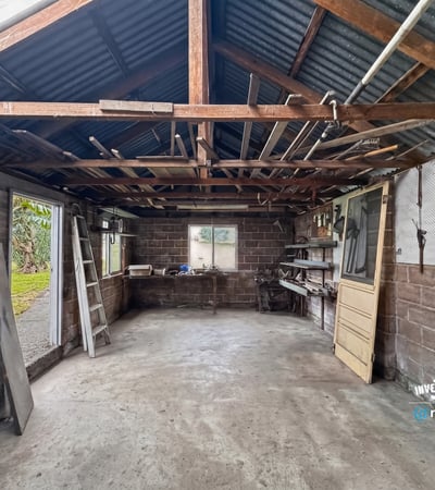 Spacious workshop with open layout, ample natural light, and potential for customization to suit your needs.